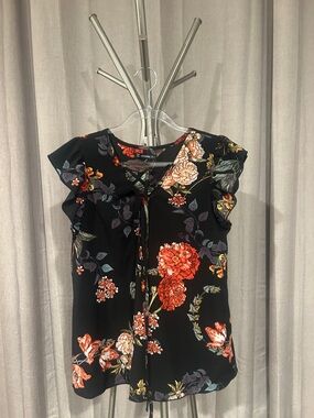 Tie-Front Floral Ruffle Sleeve Blouse - Black with vibrant Flowers.